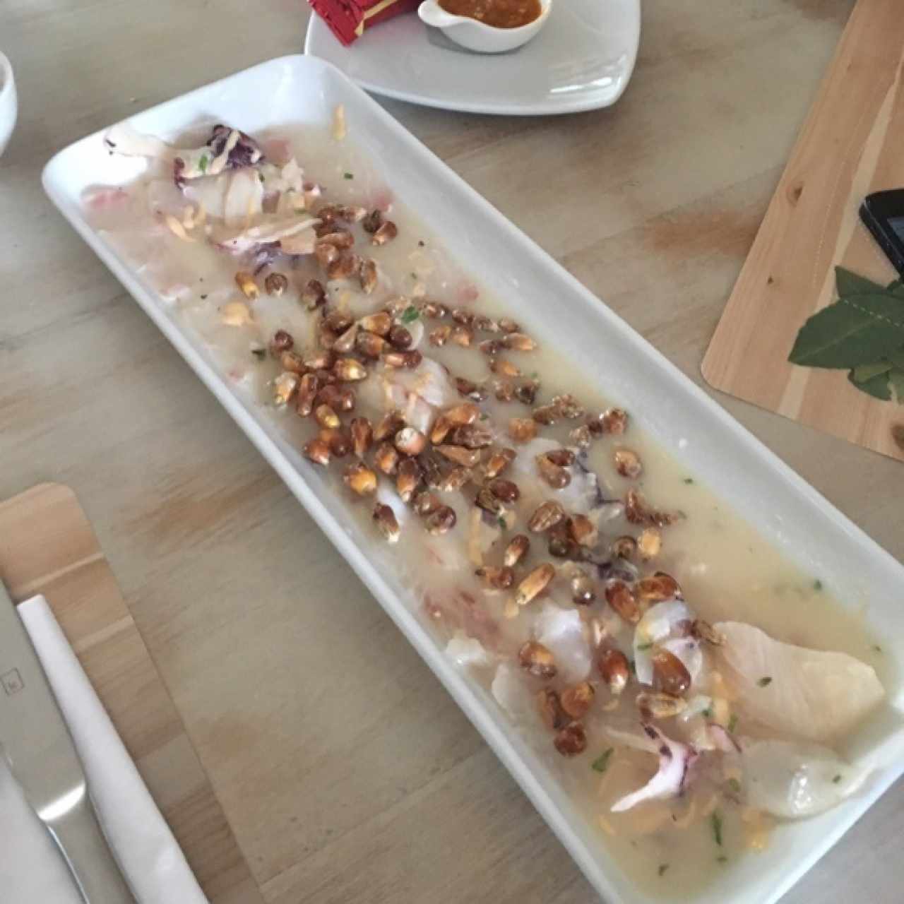 tiradito de pulpo y pescado en leche de tigre