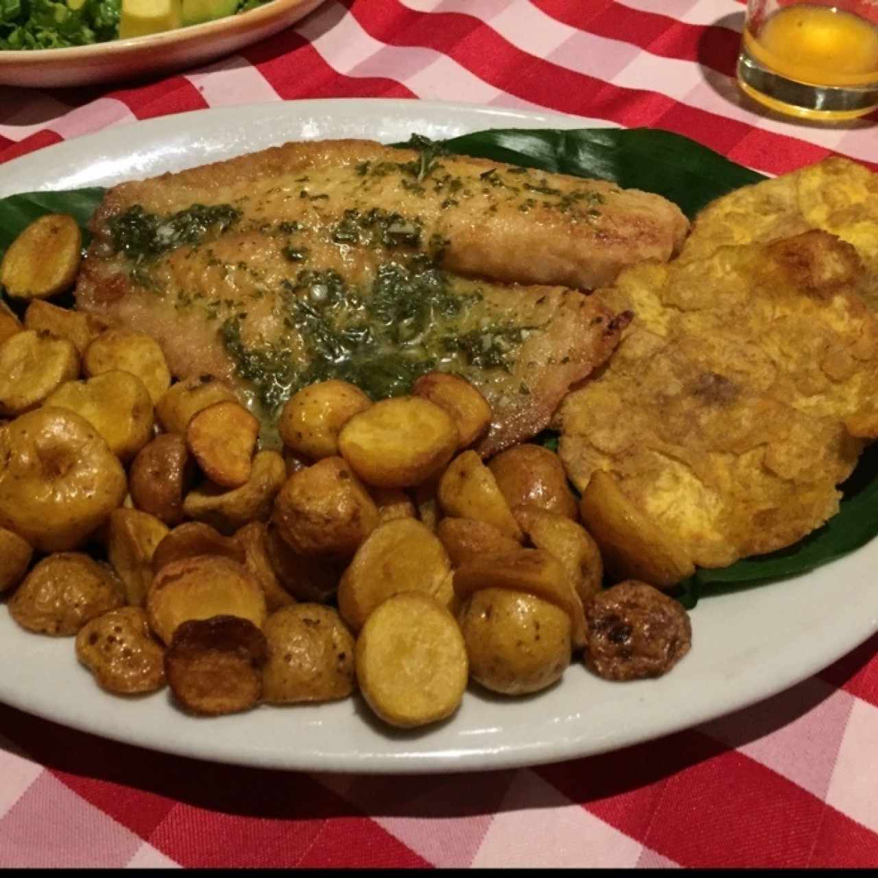 Tilapia en hojas de Biao