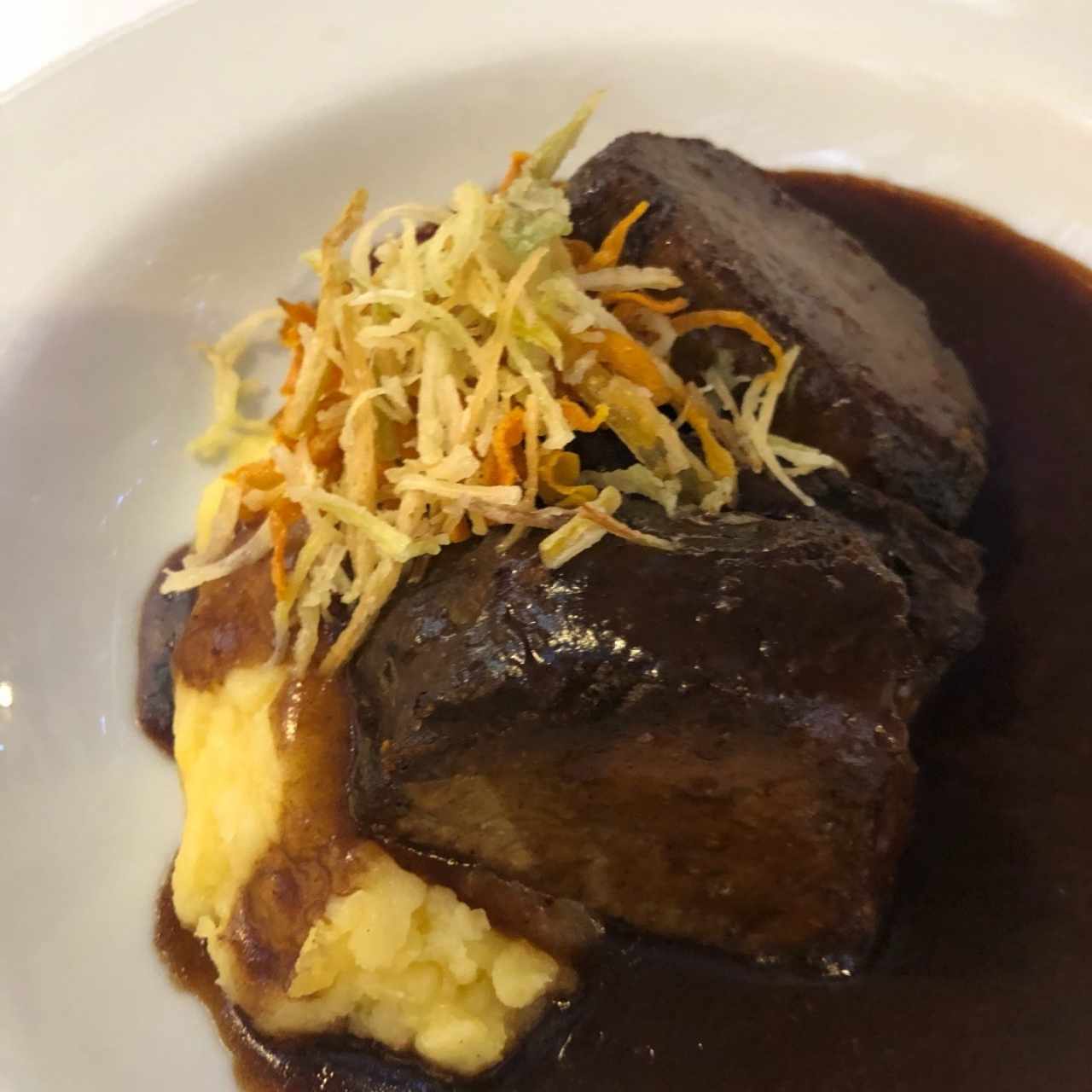 morillo en salsa de panela y pimienta de cayena