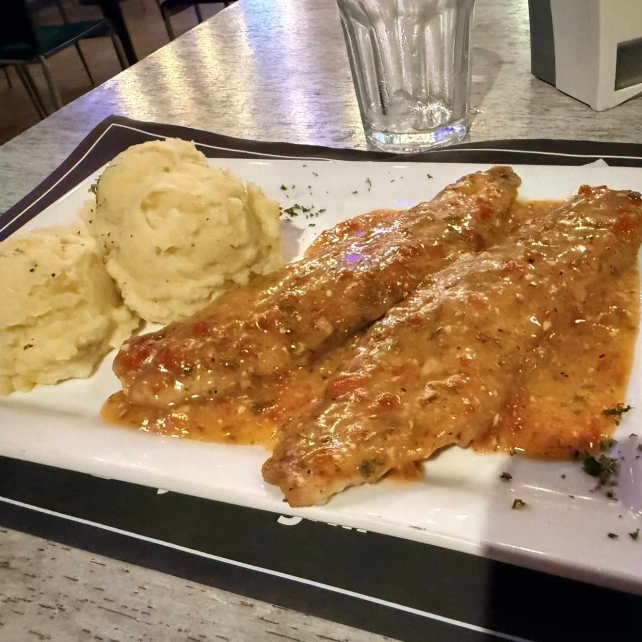 Filete pescado al ajillo
