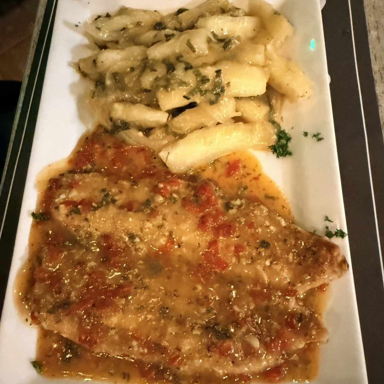 Filete pescado al ajillo