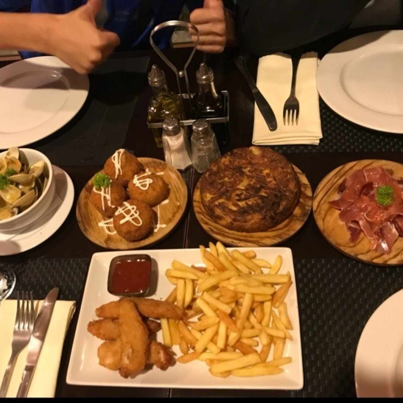 almejas al ajillo, croquetas de jamon, tortilla espanola, jamon iberico y deditos de pollo
