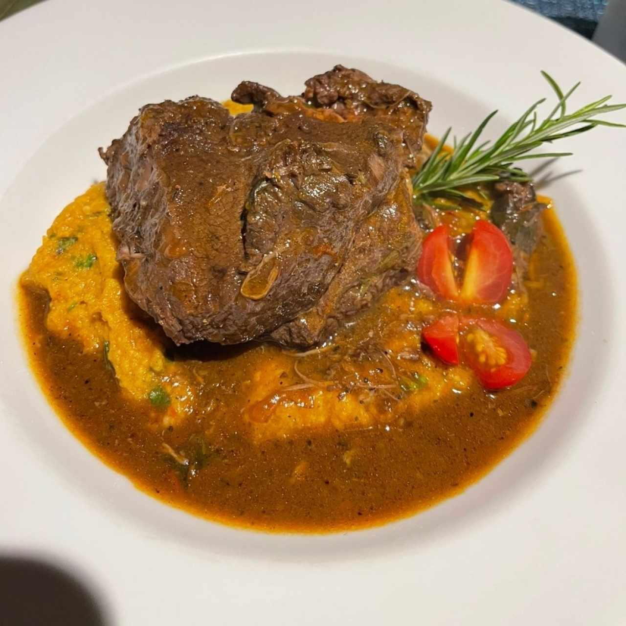 asado de tira con tamal de olla