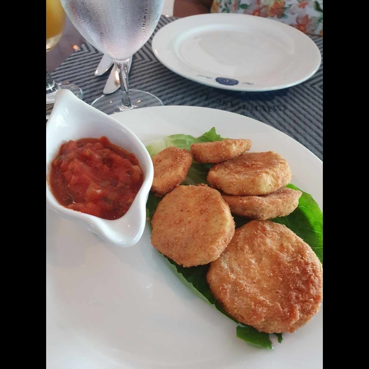 Berenjenas apanadas Fritas en Salsa Pomodoro
