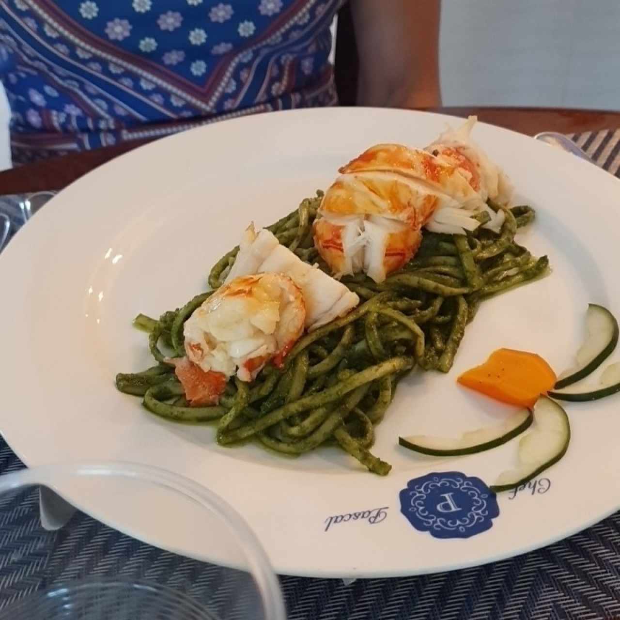 Langosta en Medallones sobre fetuccine al Pesto