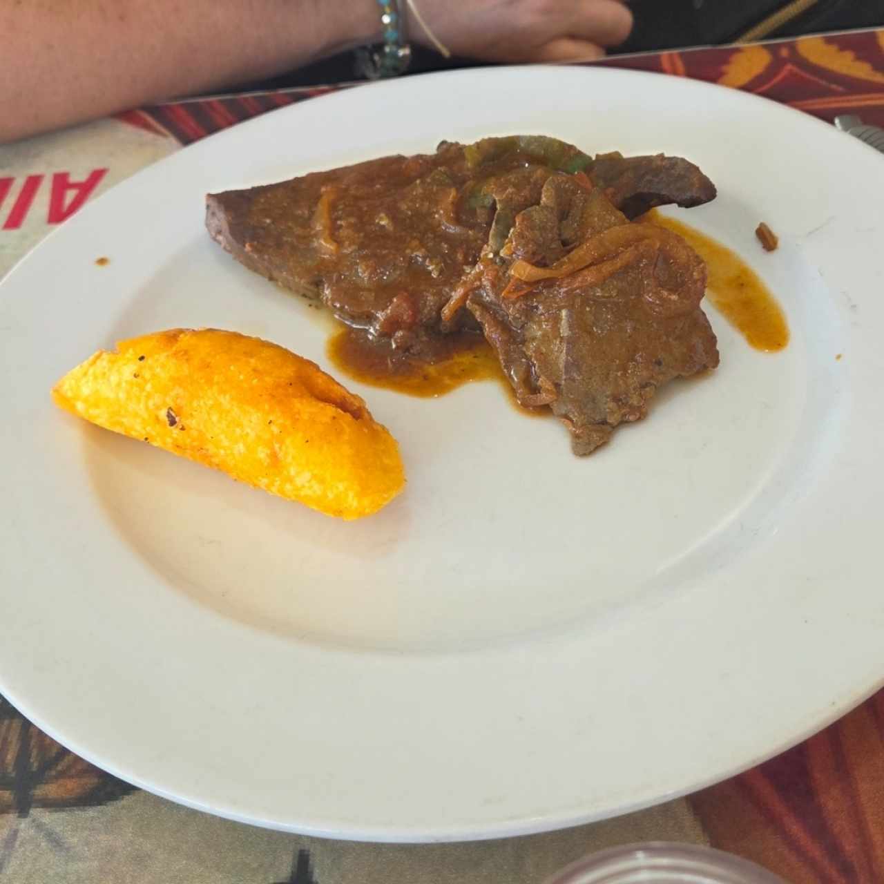 hígado con empanada