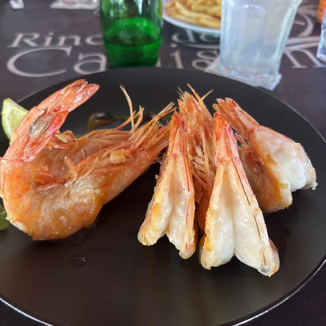 Langostinos a la criolla/ Plancha/ sal / ajillo / apanado