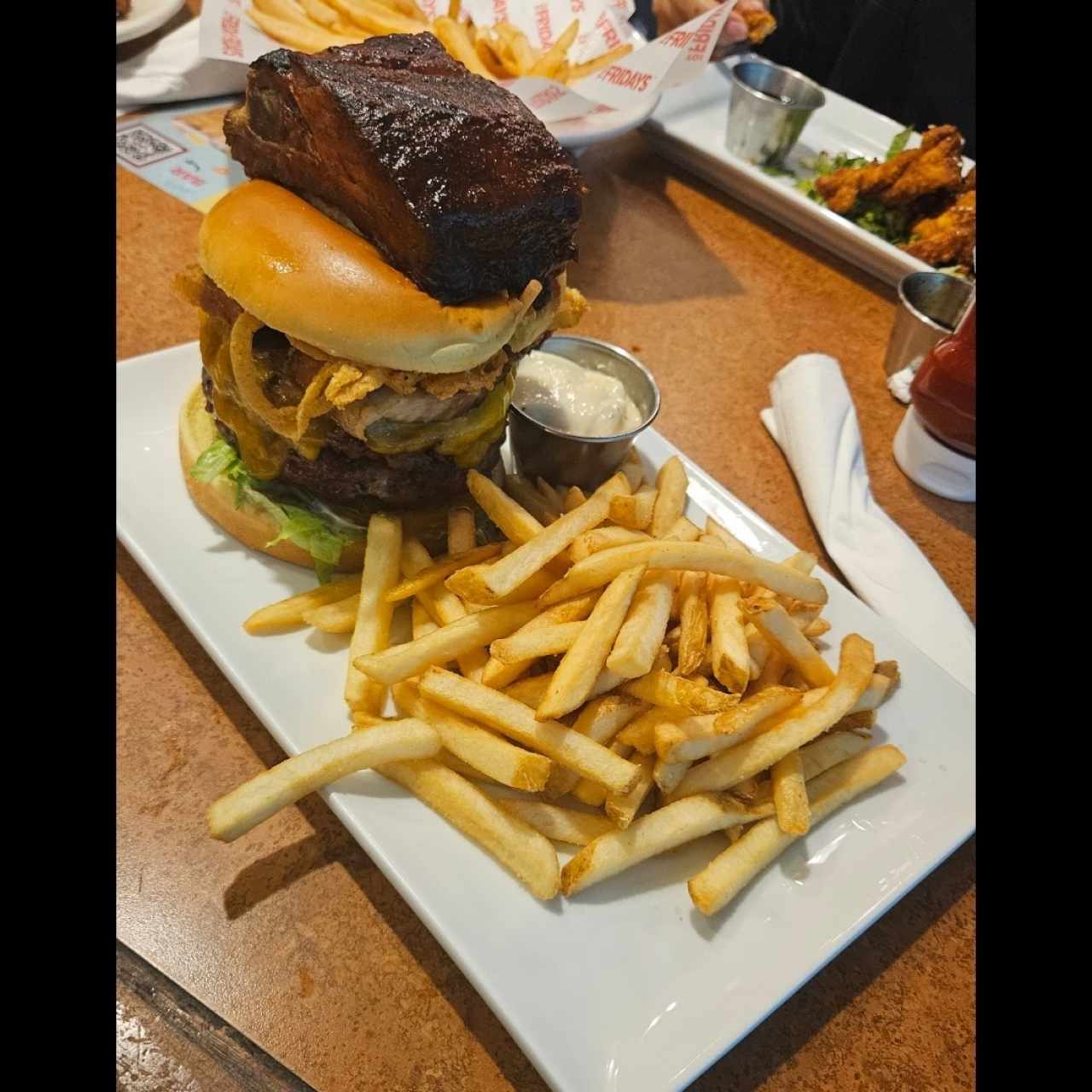 BIG AF FRIDAYS ULTIMATE SIGNATURE WHISKEY-GLAZED BURGER