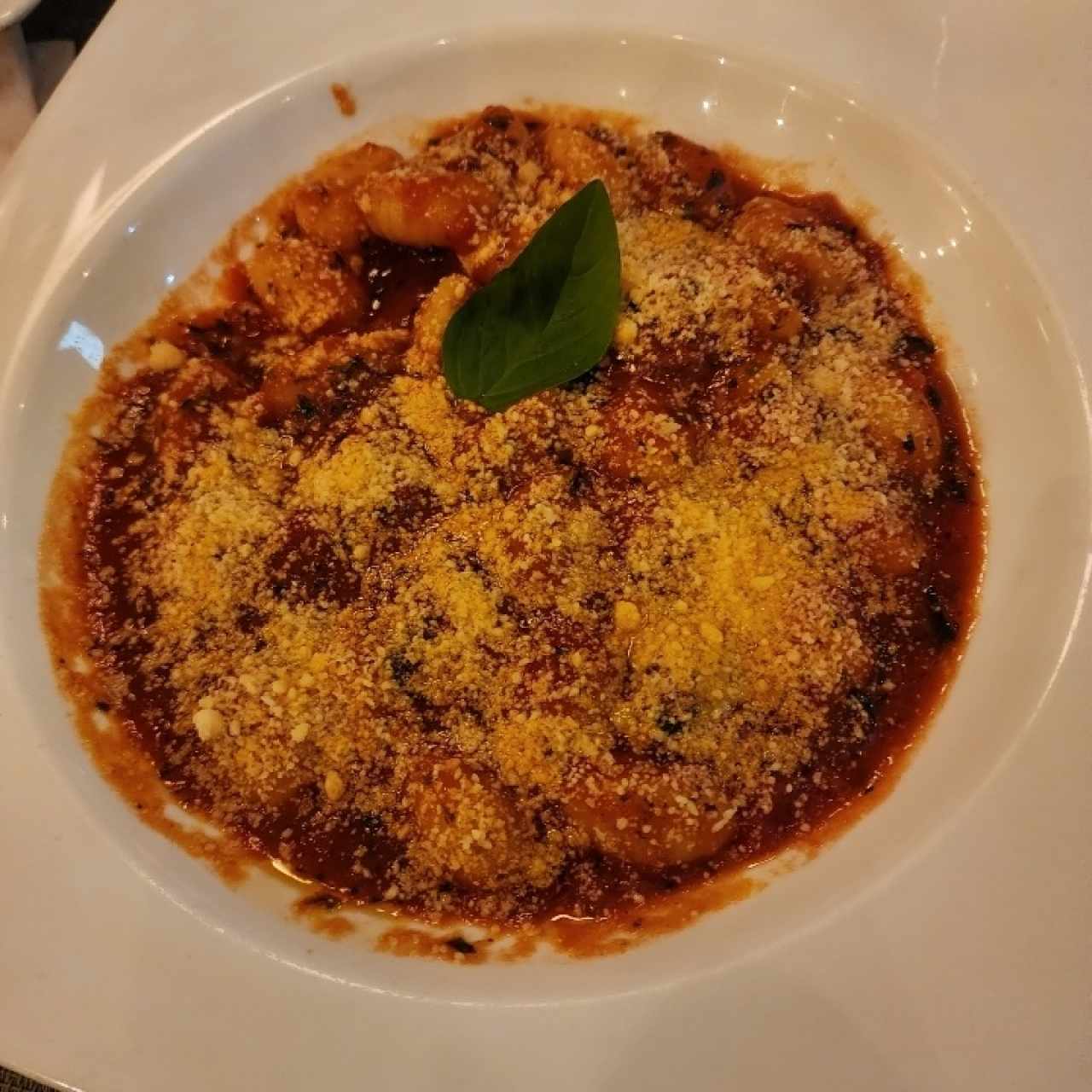 Ñoquis a ña parmesana