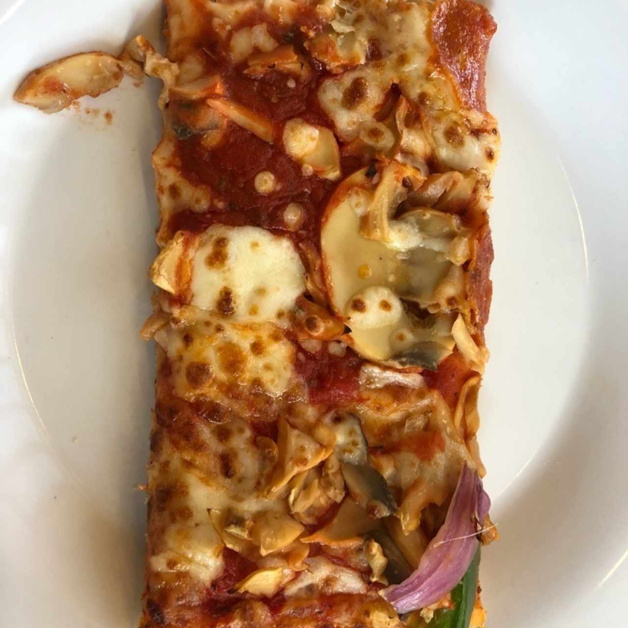 Porcion pizza con hongos