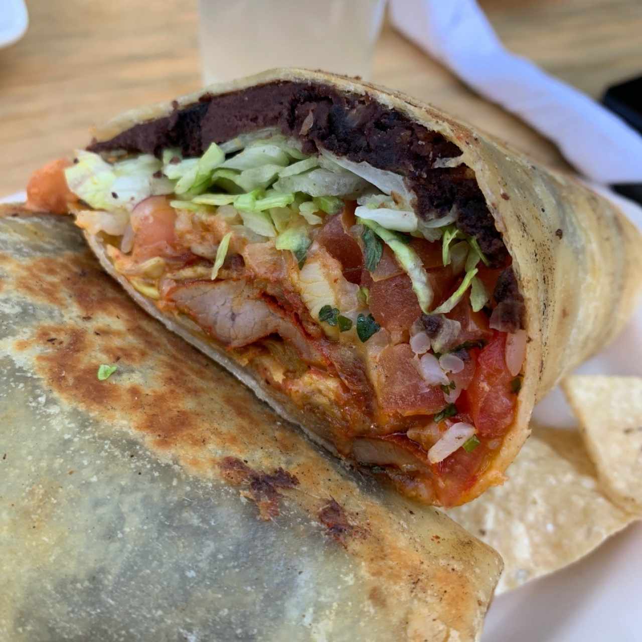 Pollo, Chorizo, Adobado, Carnitas, Chicharrón, Res o Vegetariano