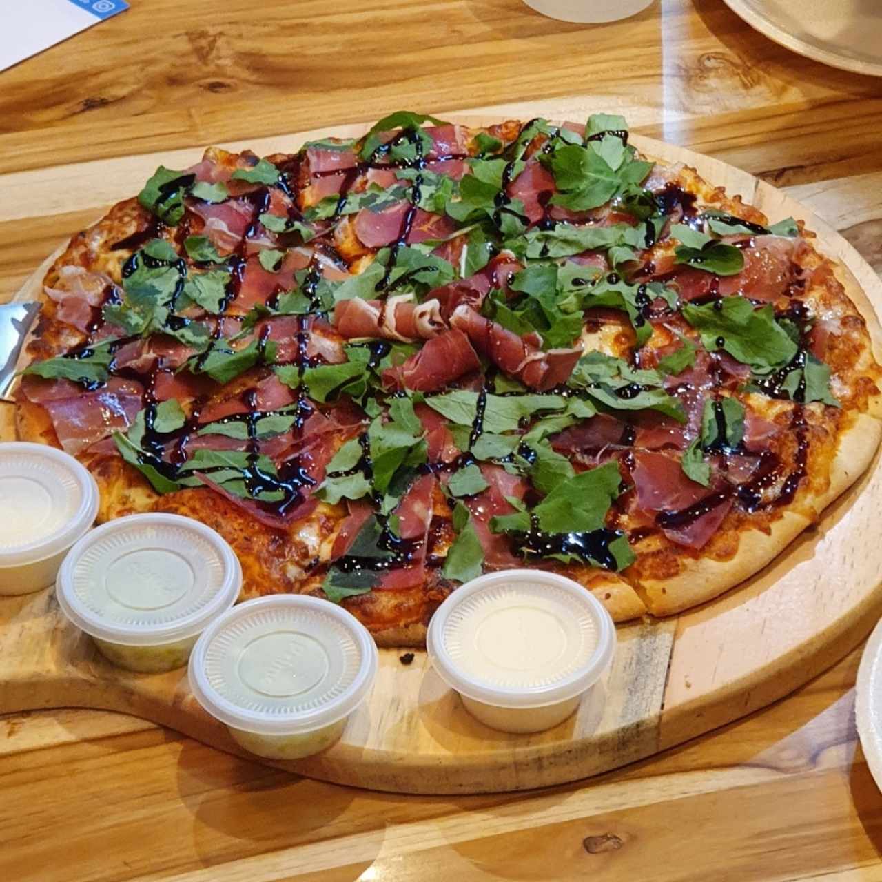Pizzas Bistro - Prosciutto y arugula