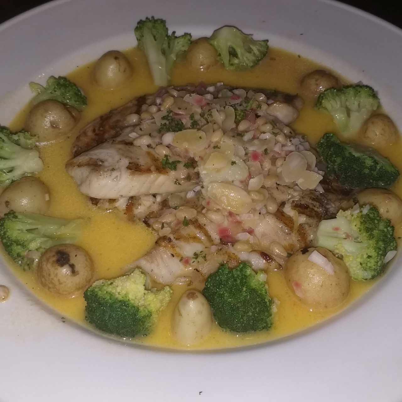 Della Cucina - Pesce Pinoli