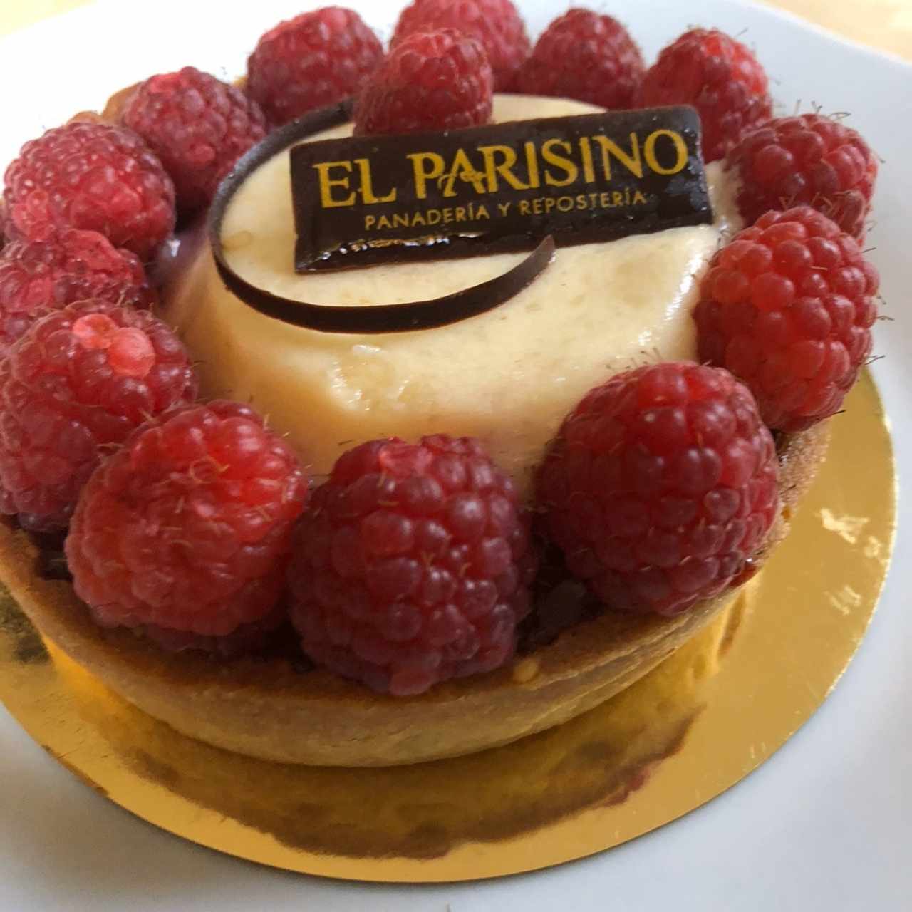 tartaleta de limon con frambuesa