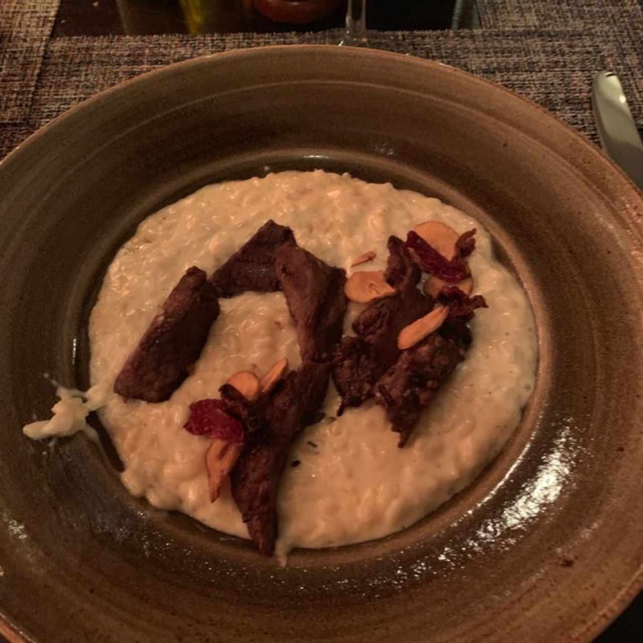 Risotto con lomito y queso parmesano