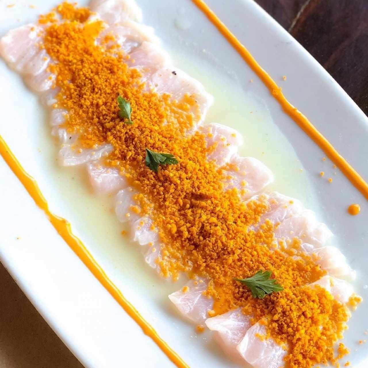 Tiradito de Róbalo al aroma de chipotle