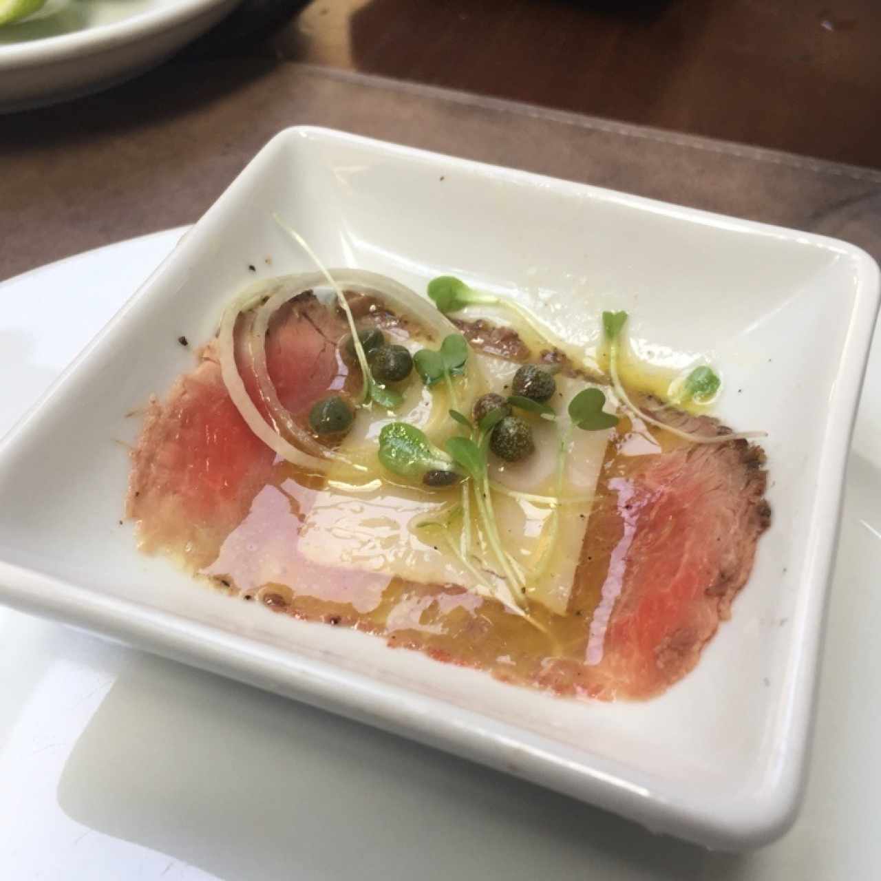 Entrada de Carpaccio...cortesía de la casa