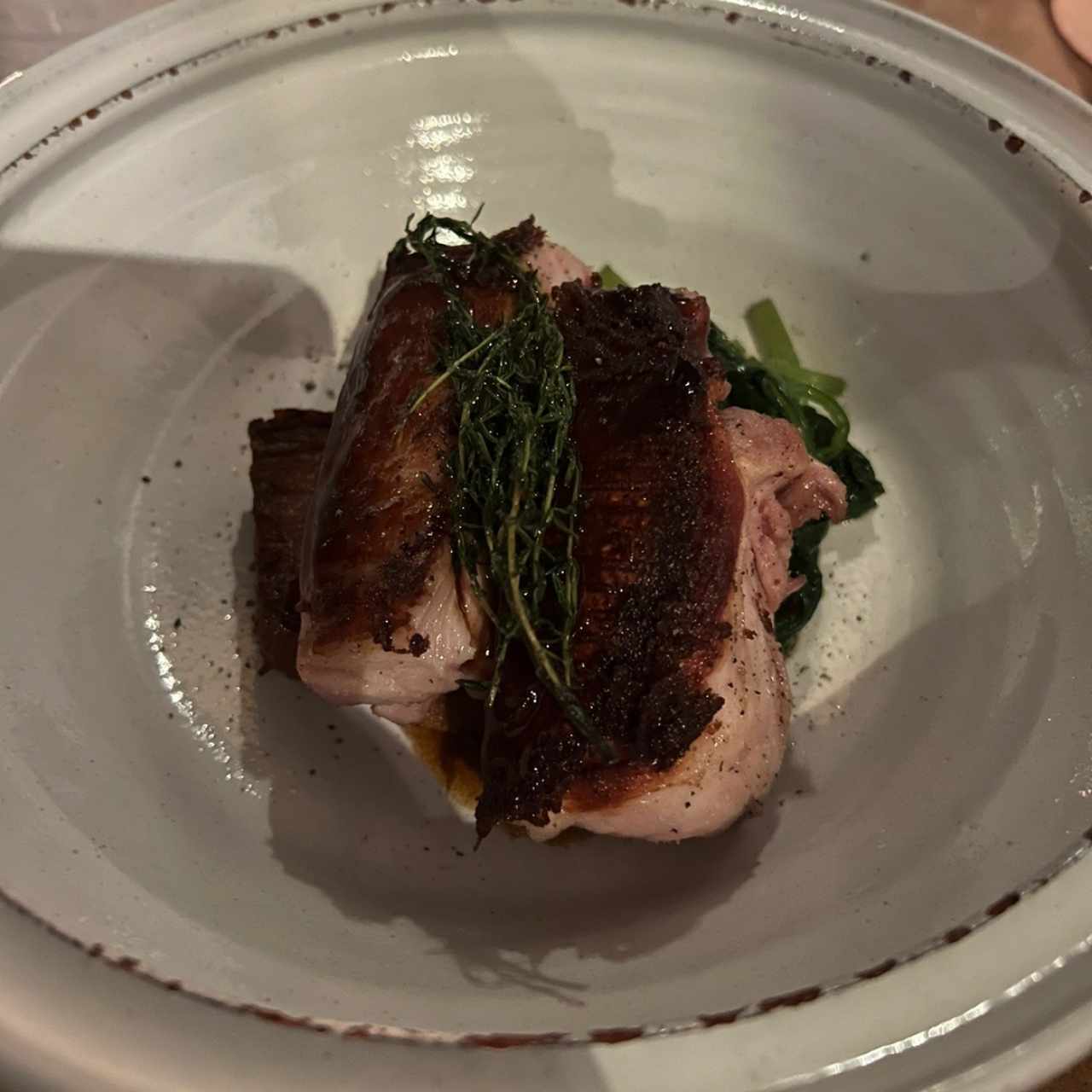 Lechon con Miloja de Papa y Acelga