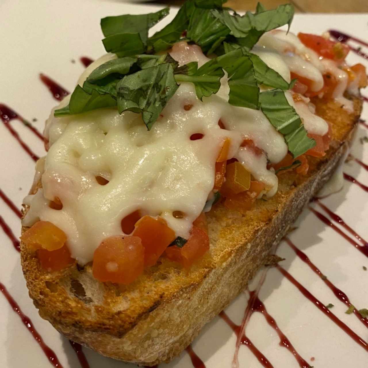Bruschette de tomate gratinado