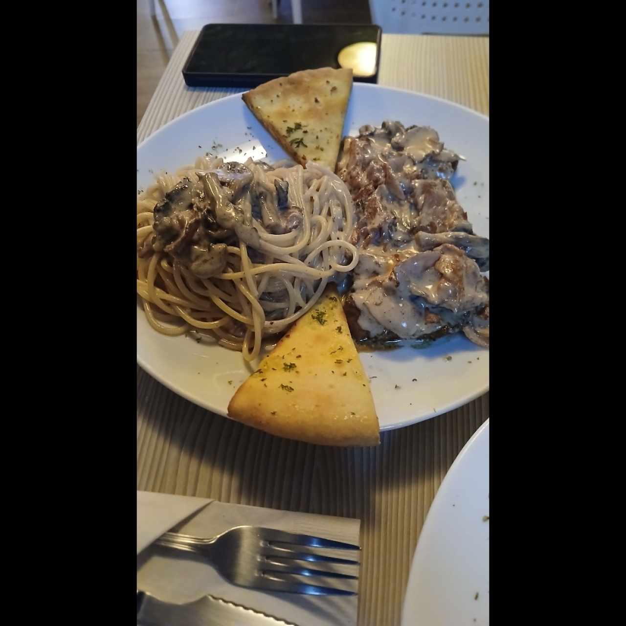 Carne con champiñones