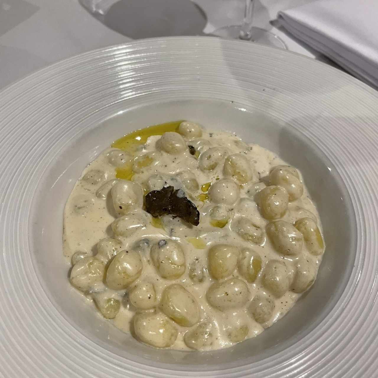Ñoquis 4 quesos con trufa 