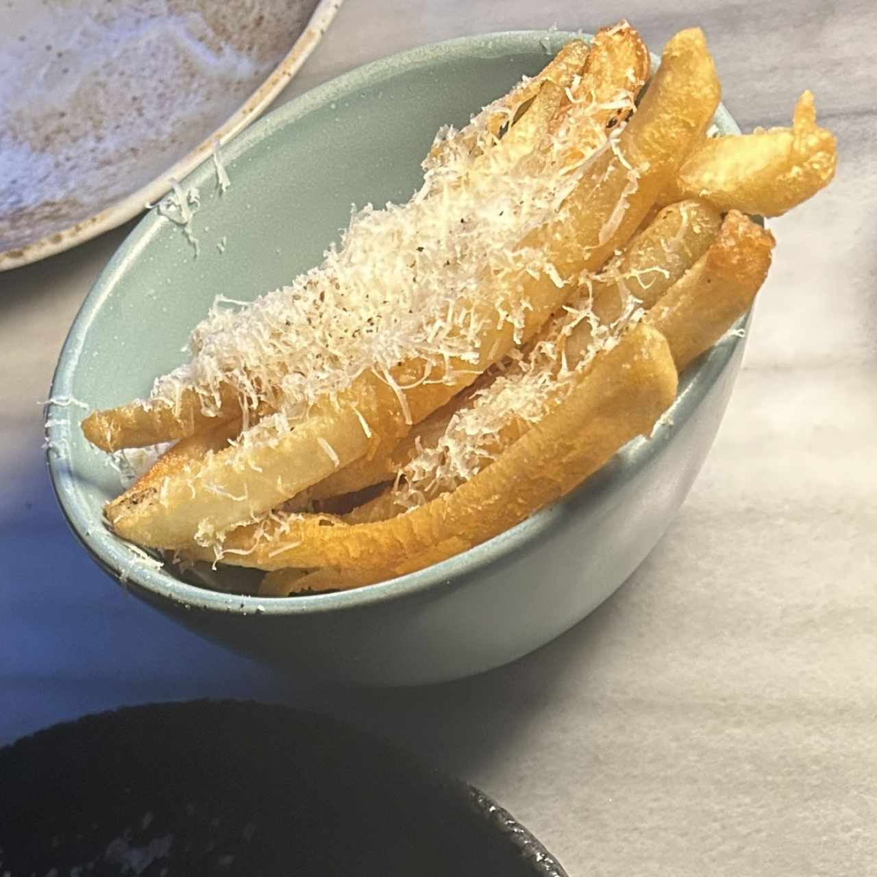 Papas Francesas con Perfume de Trufas y Granna Padano