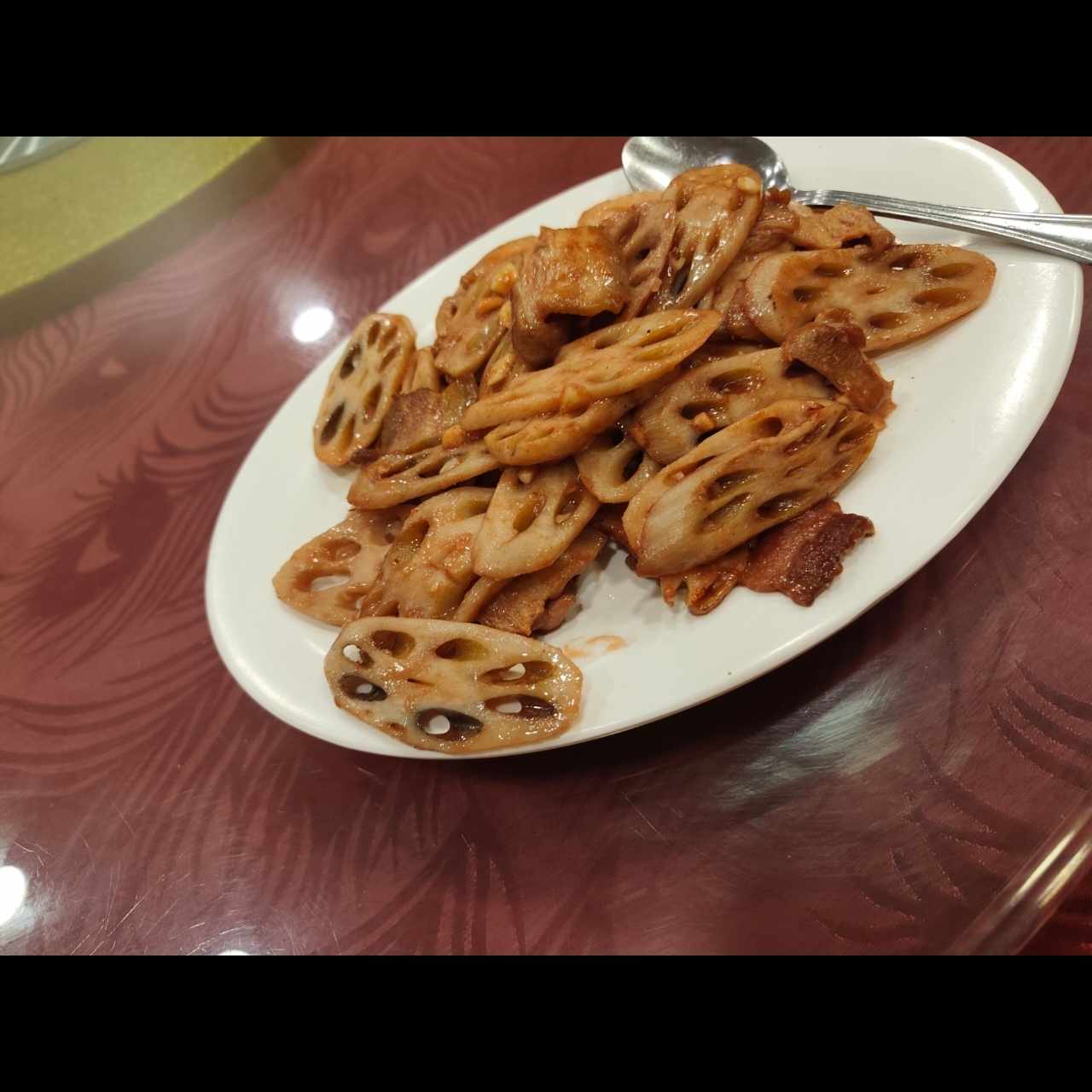 lotus salteado con puerco