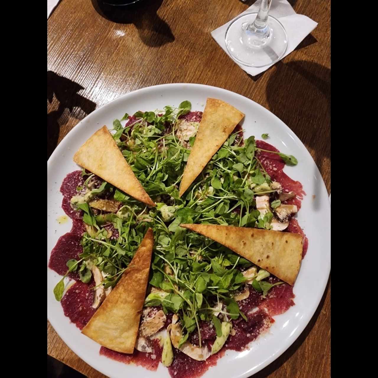 Carpaccio de res, sin tomate cherry