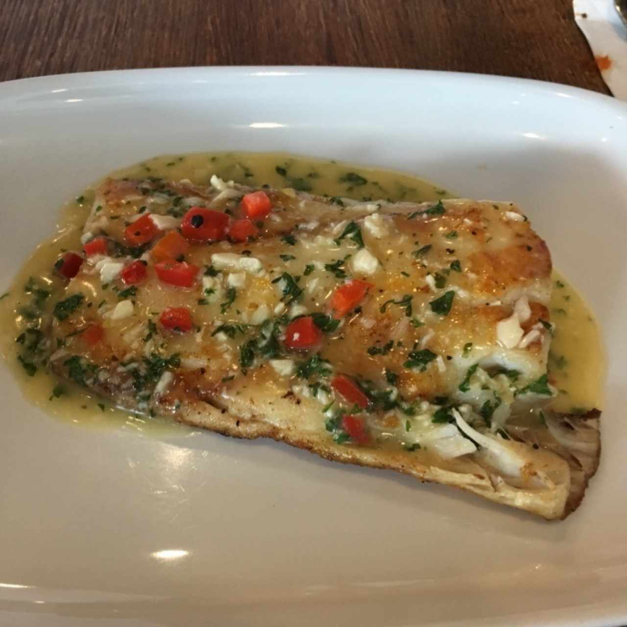 Filete de pescado al ajillo