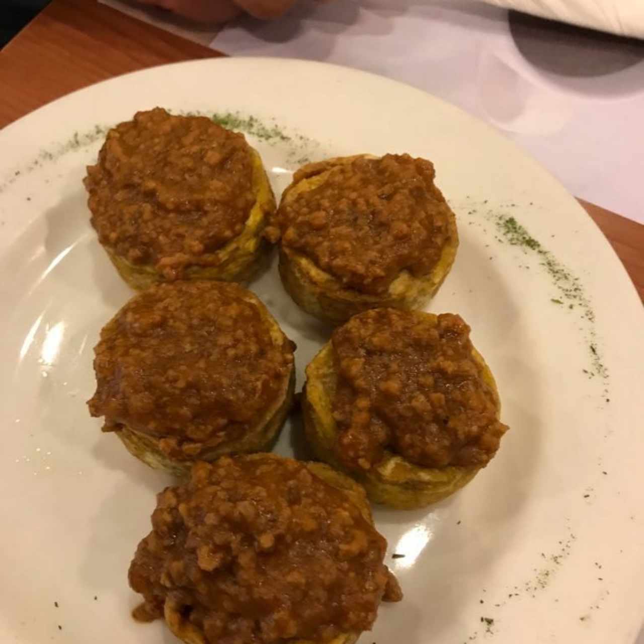 patacon con boloñesa
