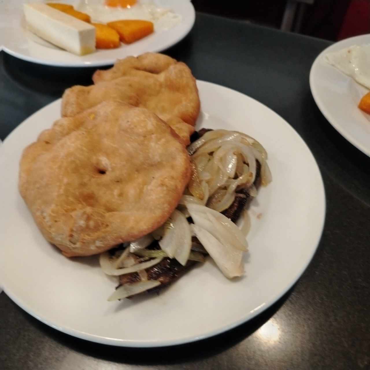 Bistec Encebollado 