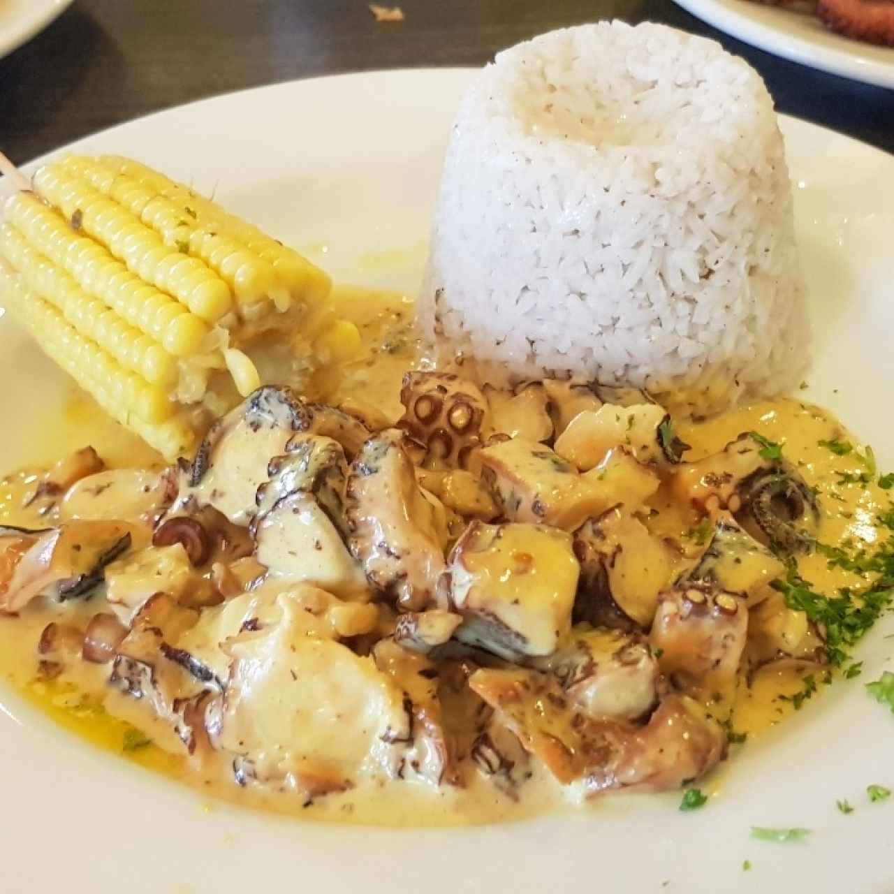 pulpo con curry y coco