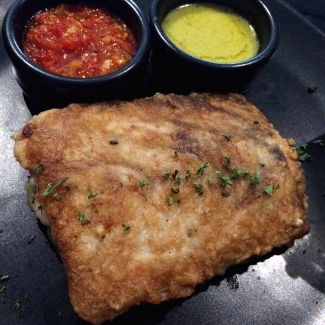 Filete de corvina en salsa de gengibre, ajo y limón