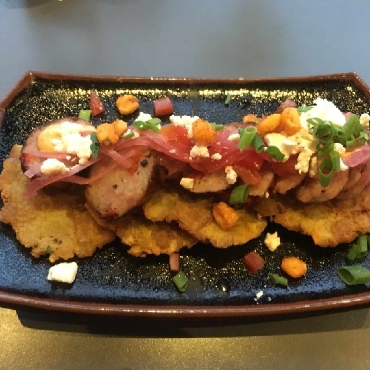 Chorizo Mediterráneo y Patacones