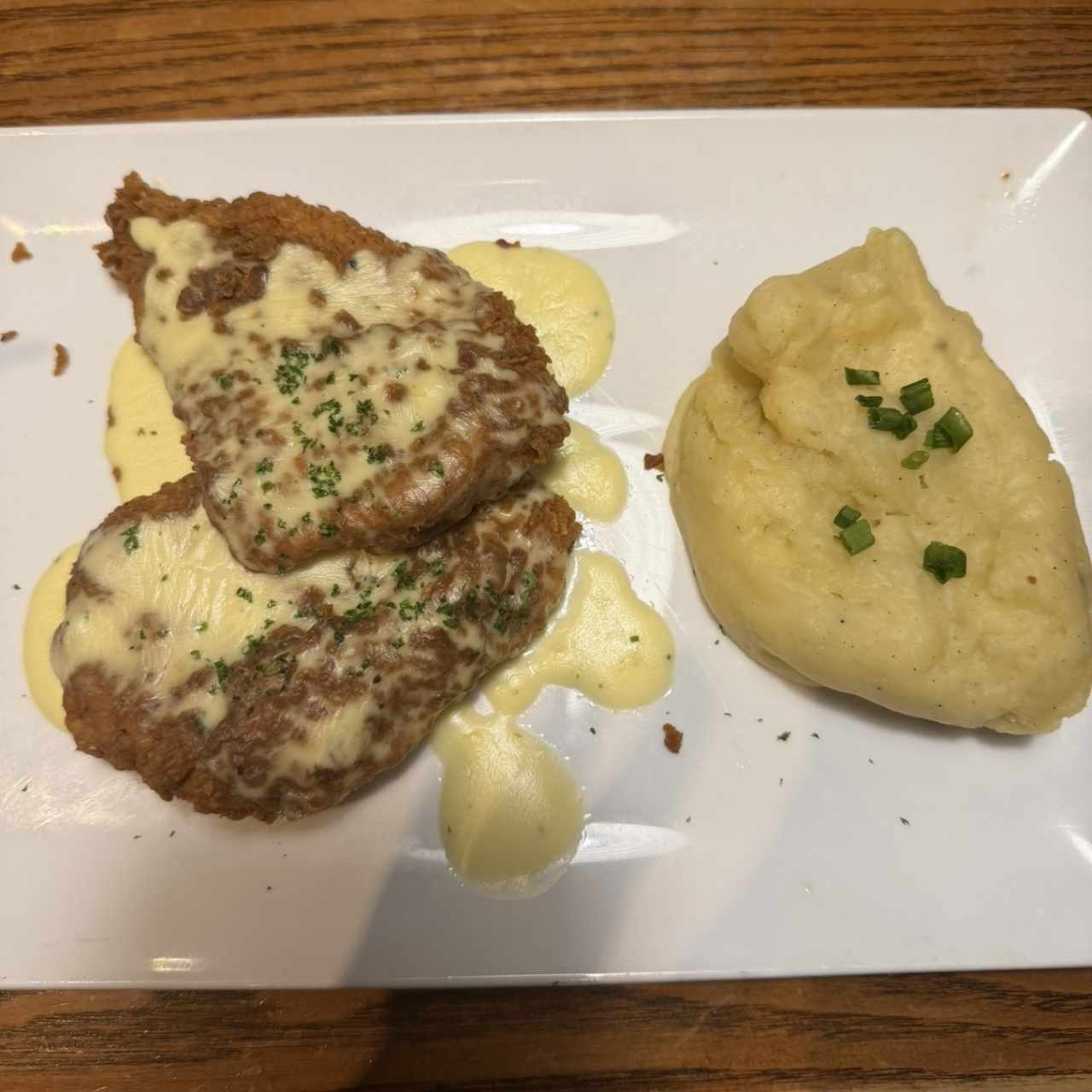 Milanesa de pollo con pure