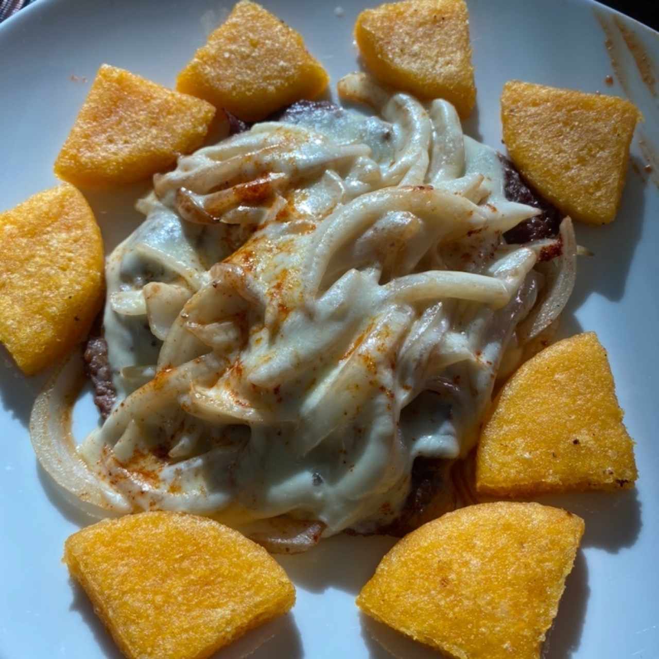 Bistec de res con queso gratinado