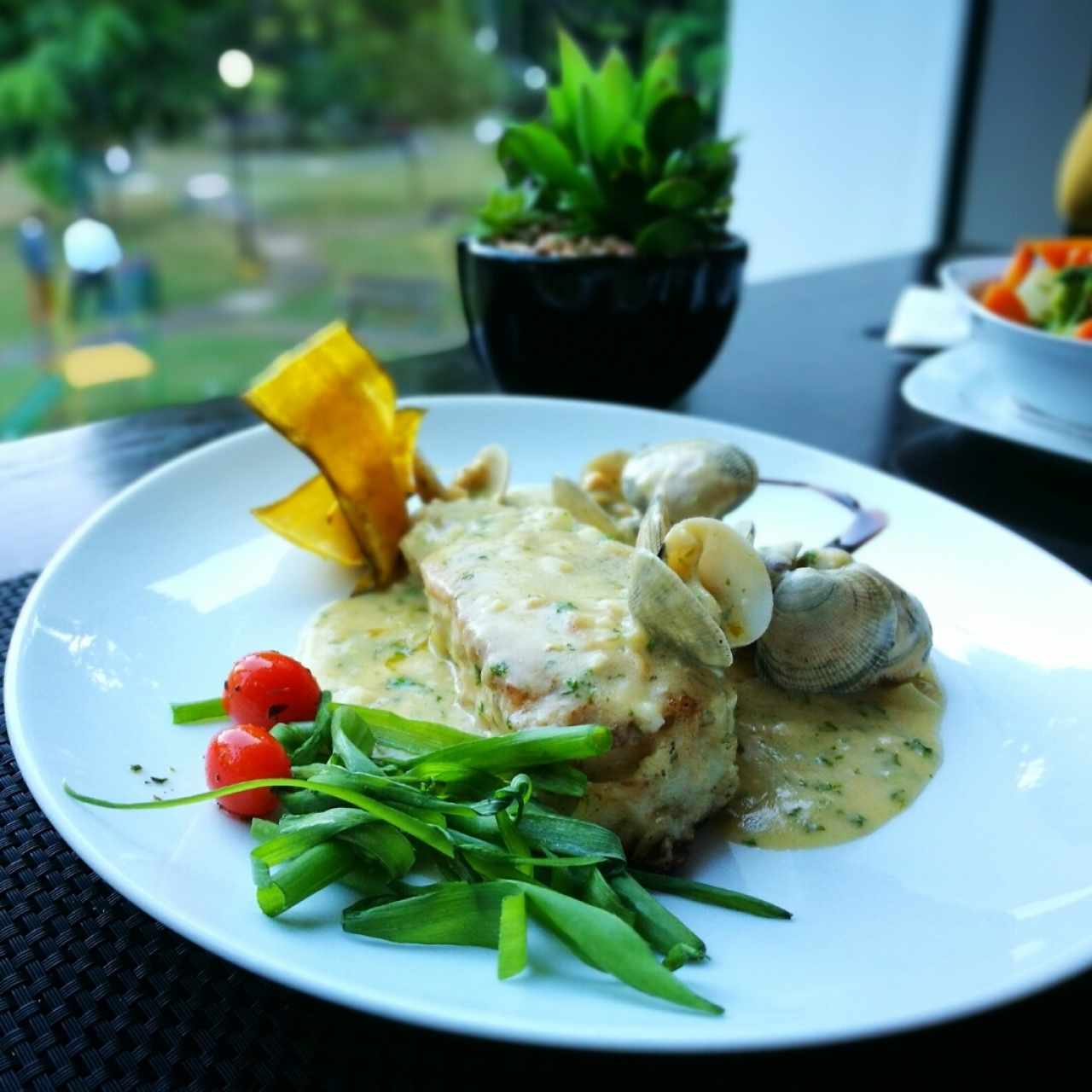 Corvina con almejas tío Pepe