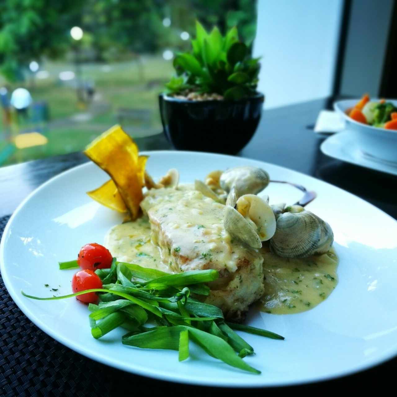 Corvina con almejas tío Pepe