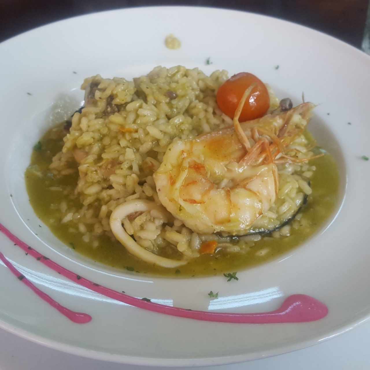Risotto frutti di mare en salsa verde