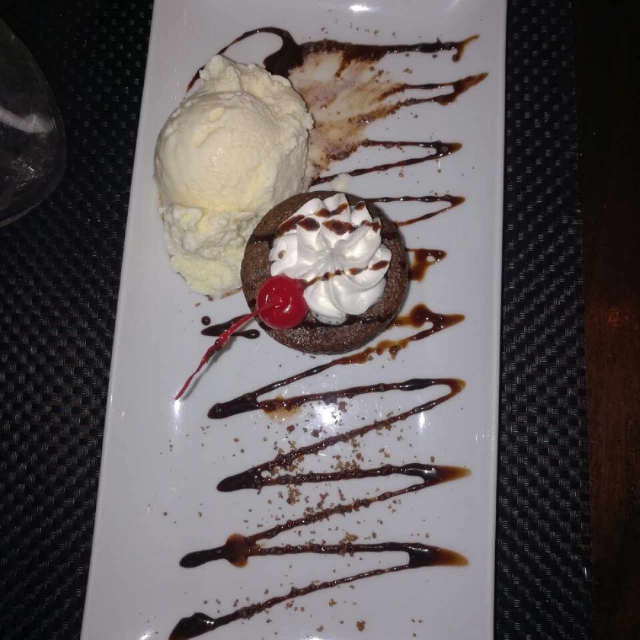 fondant de chocolate 🍫 con helado de vainilla. 