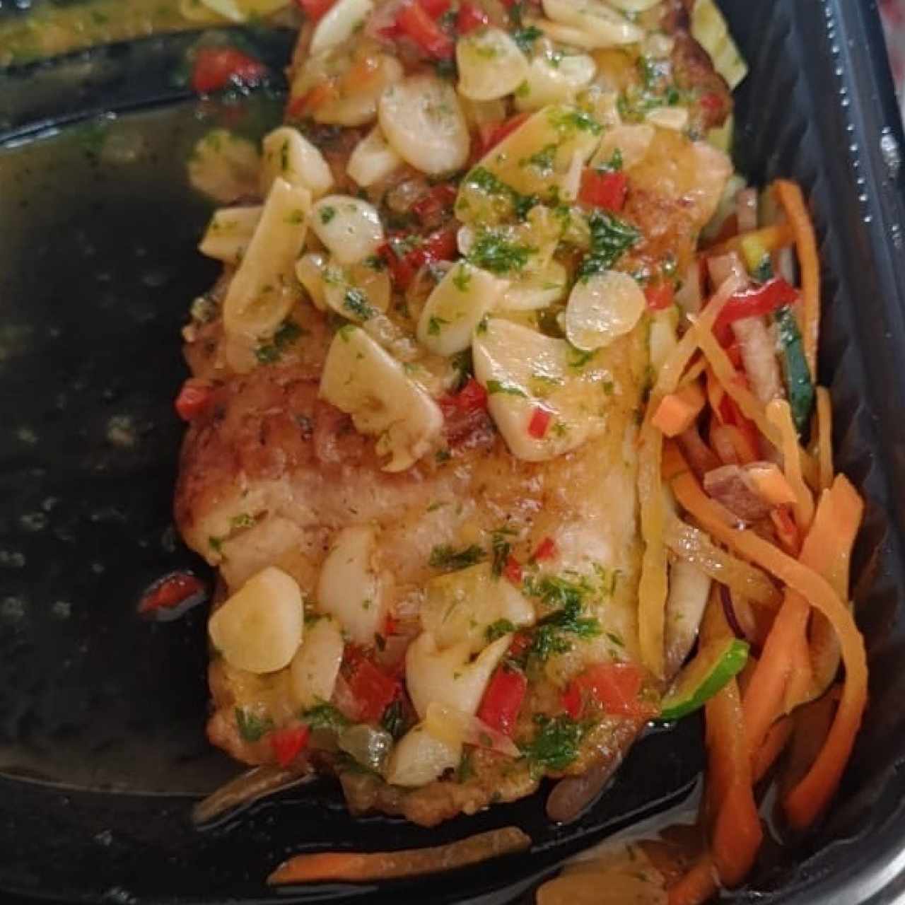 Filete de Corvina al Ajillo