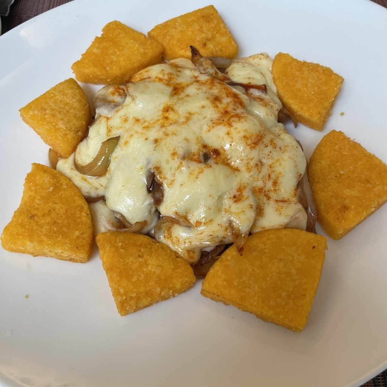 Bistec de res con queso gratinado