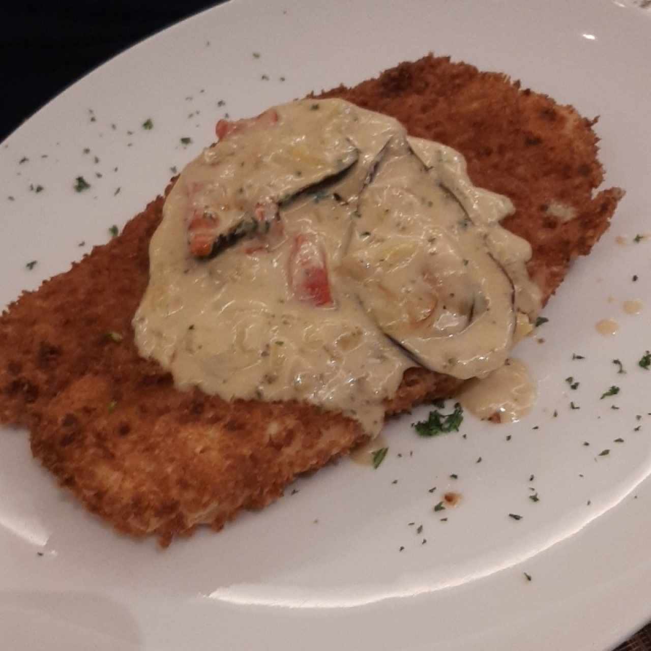 Corvina apanada Thai con mejillones