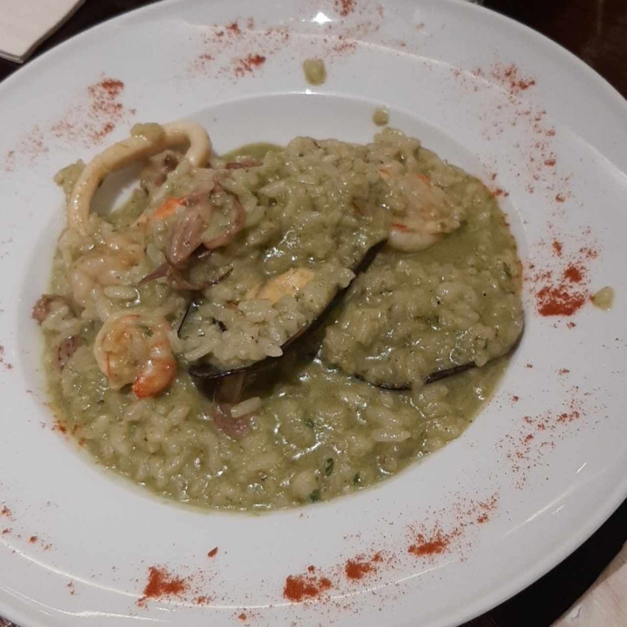 Risotto frutti di mare en salsa verde
