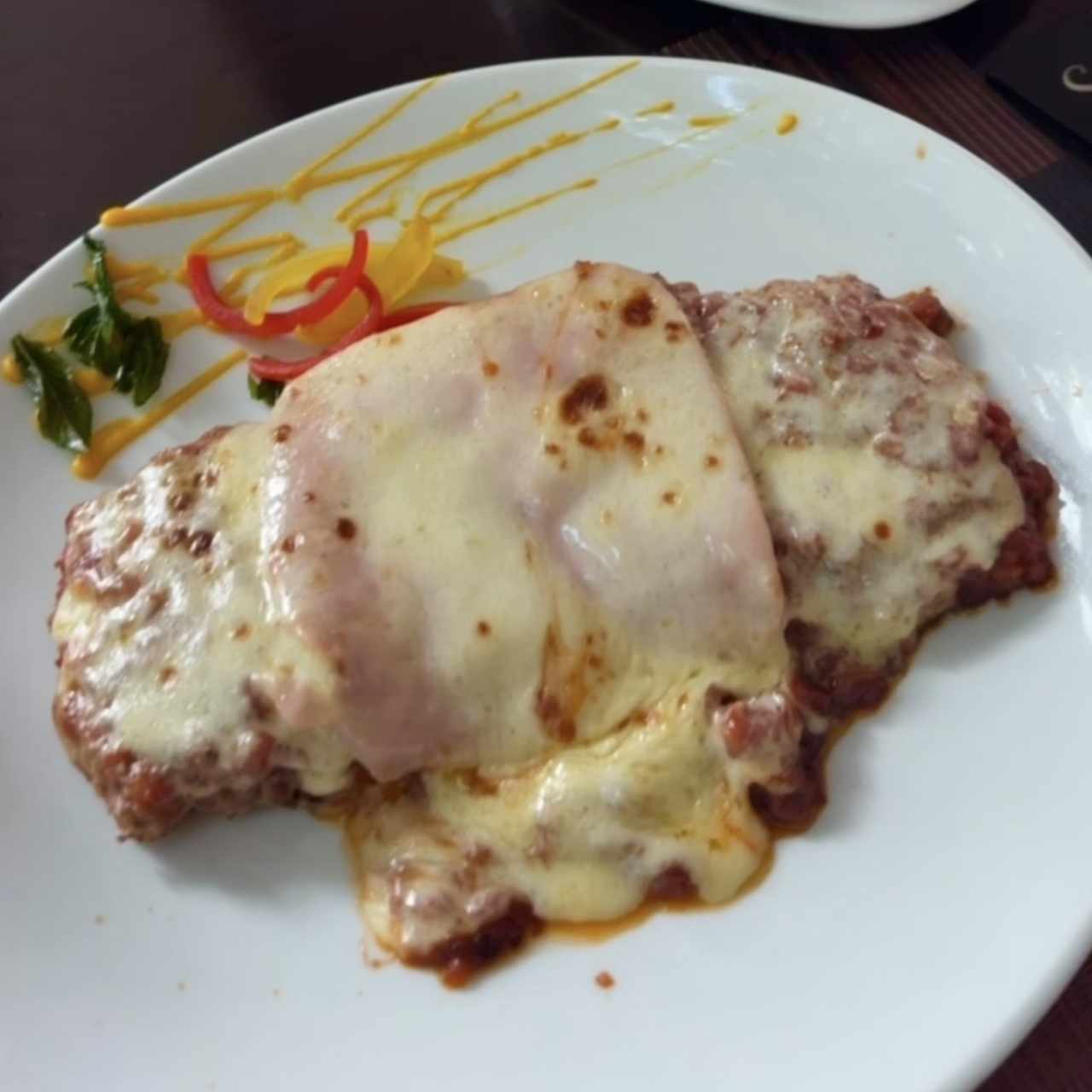 Milanesa de filete de res a la napolitana