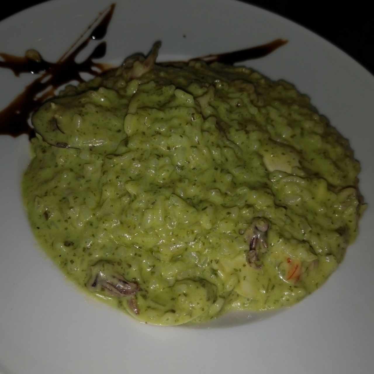 Risotto frutti di mare en salsa verde