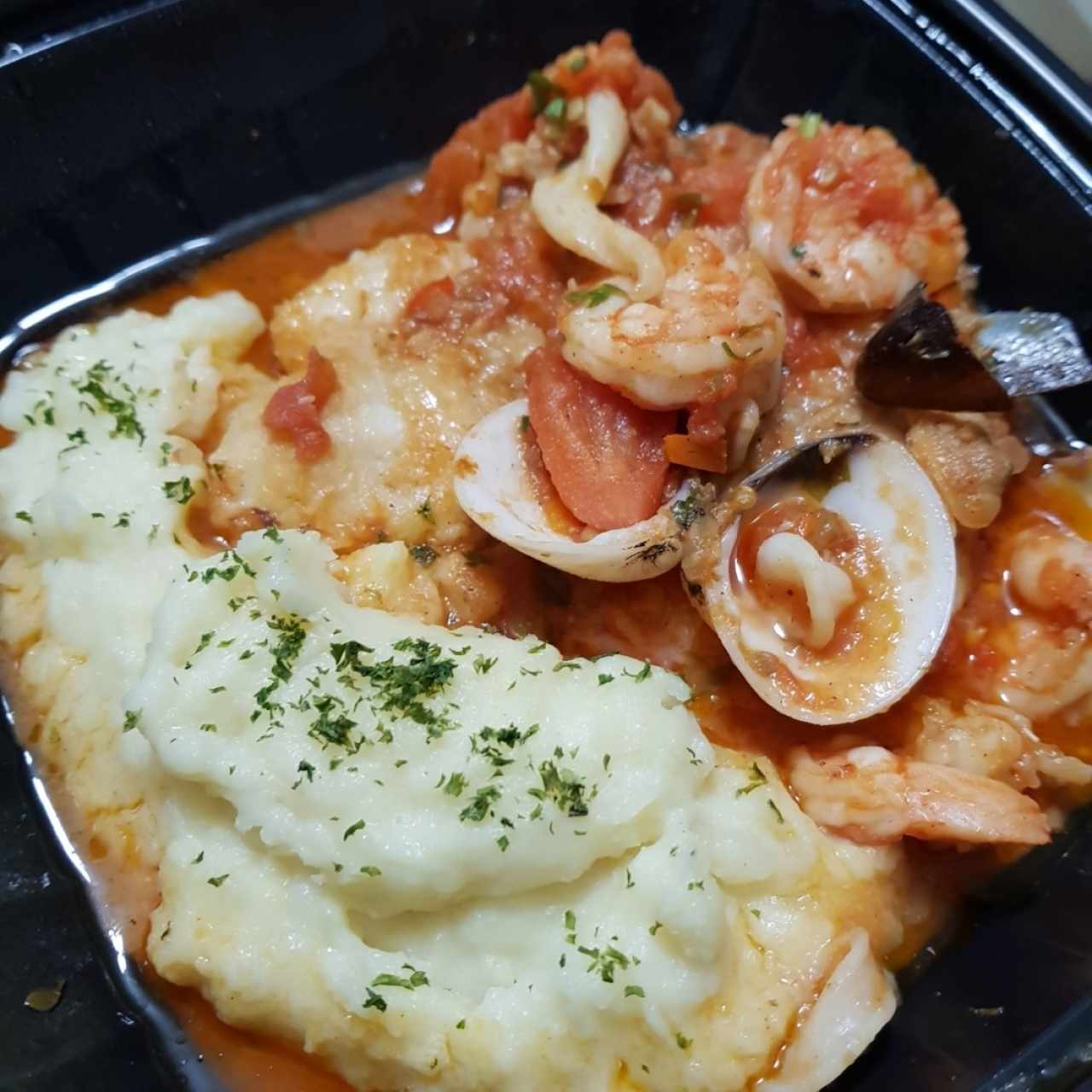 Filete de Corvina a la Marinera.