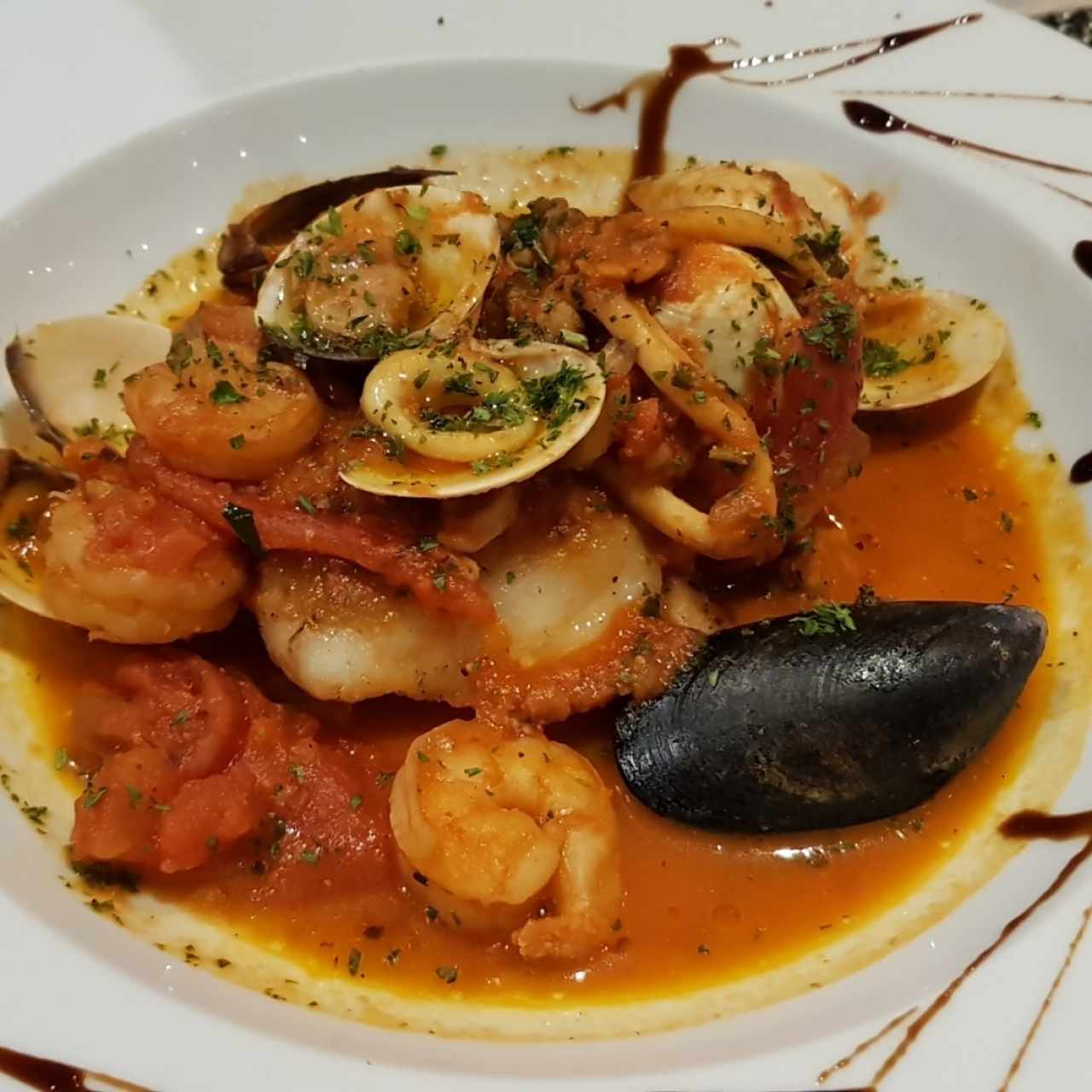 corvina con mariscos
