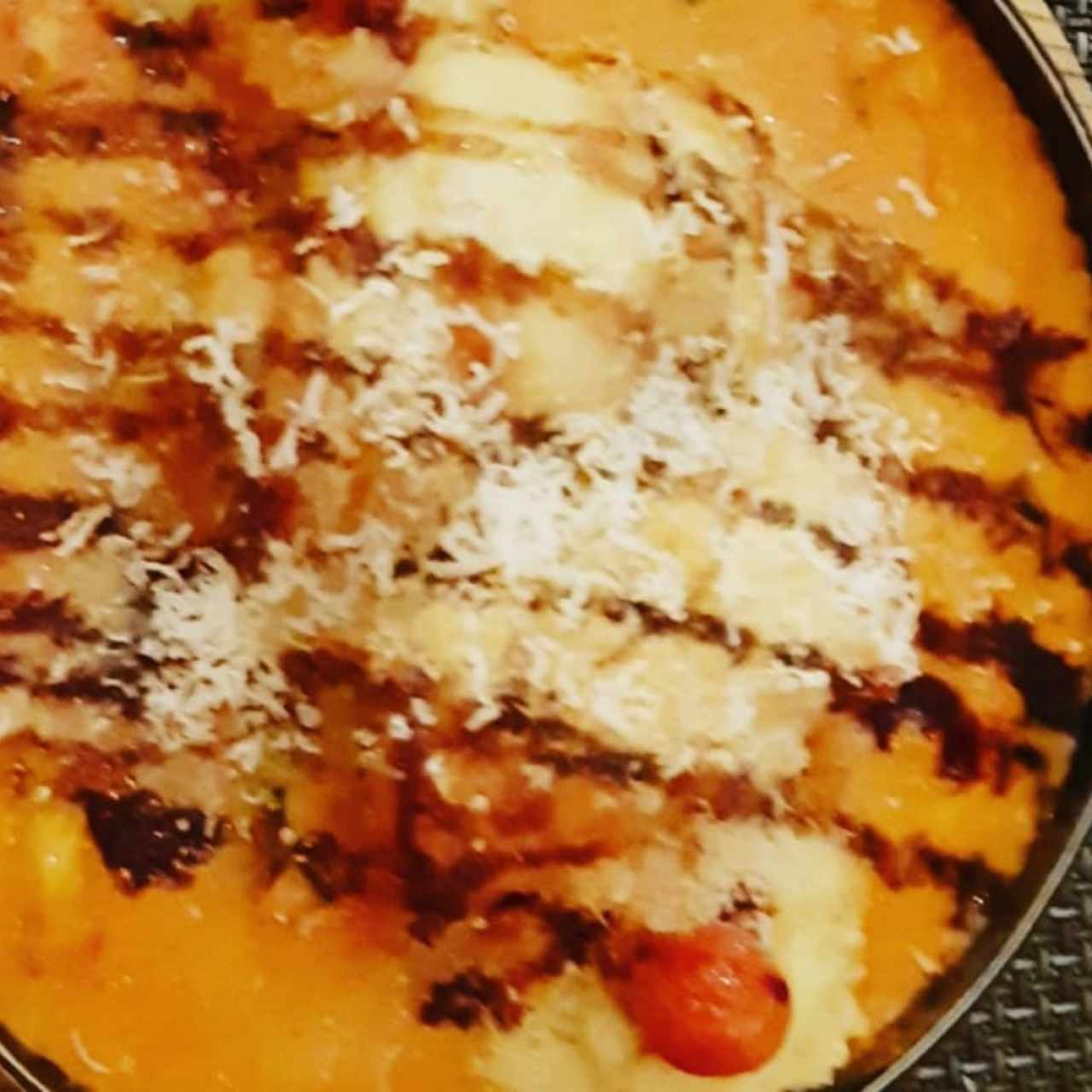 pesca del dia (corvina gratinda rellena de berenjenas)