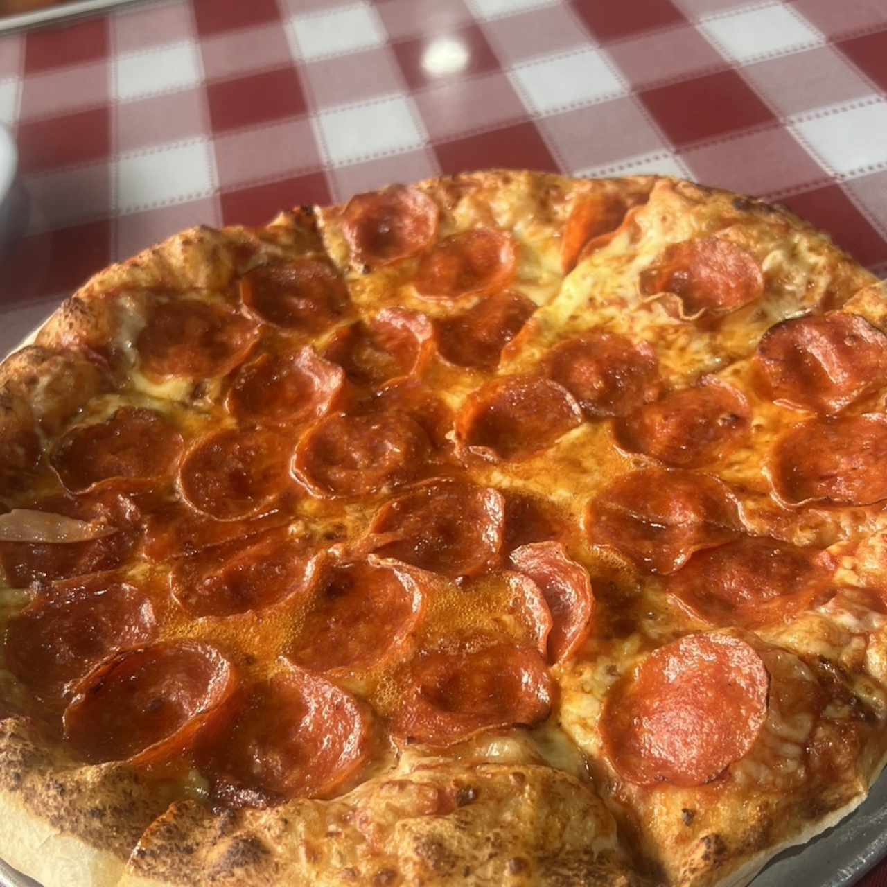 Pizza con pepperoni mediana